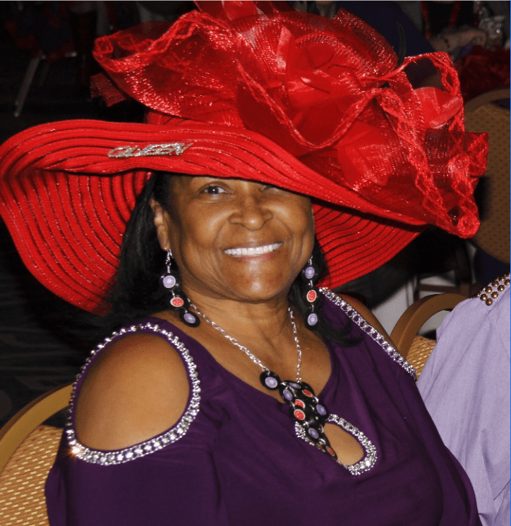 Red Hat Society member with big hat